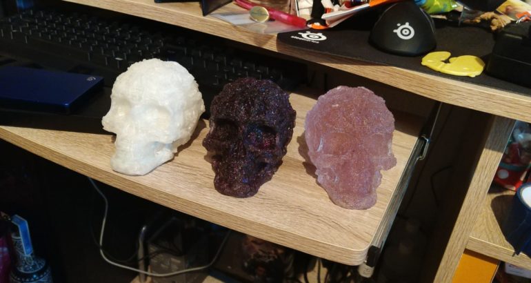 A 3D printed and 2 resin cast skulls